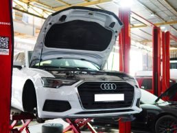 Audi engine repair on a lift at Dar Al Madina Garage Dubai